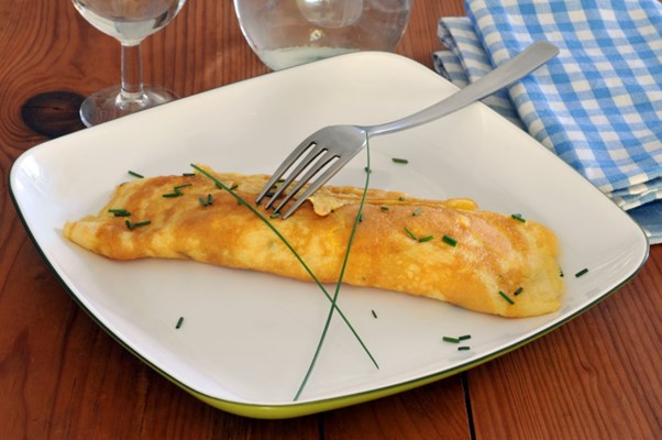 Recette de Omelette roulée aux fines herbes