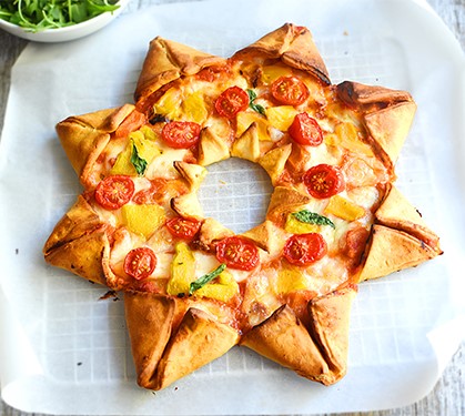 Recette de Pizza étoile tomates mozzarella Galbani et poivrons