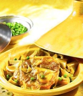 Recette de Tajine de veau au curcuma petits pois et fonds d'artichaut