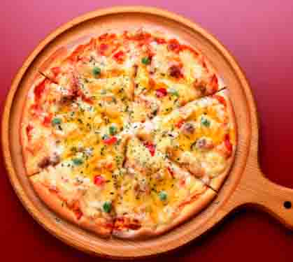 Recette de Pizza fromage et légumes