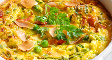 Clafoutis salé de petits pois aux herbes fraiches