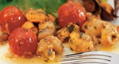 Salade tiède de tomates et coquillages