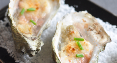 Gratin d'huîtres et Saint-Jacques au magret fumé